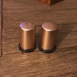 Vintage salt and pepper plastic shakers.